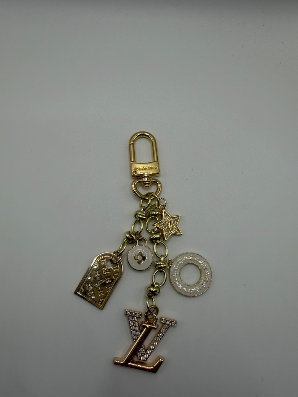 1416. Gold and Ivory Charm Key Holder